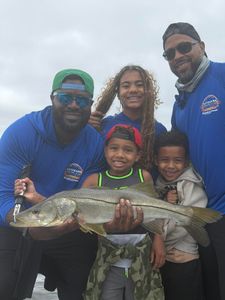 5 people fishing for snook in Riverview