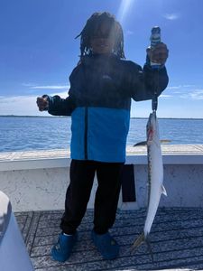 Angler with a 24-inch fish caught in FL