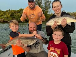 Two redfish, 27 inches long, caught in FL