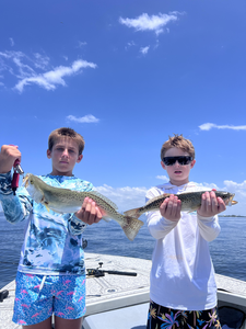 Landing a Spotted Weakfish on a partly cloudy day in Riverview!