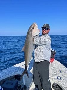 A lone fisherman in FL enjoying a great day on the water