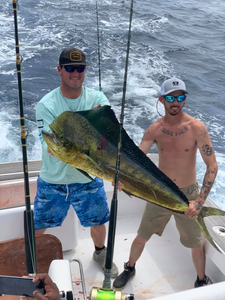 Two people enjoying a cruises and fishing trip in Morehead City