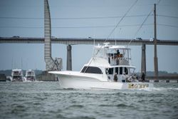 A group of 4 people enjoying a fishing and cruising adventure in NC