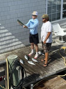Two people fishing in Morehead City