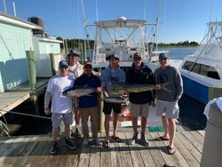 Six people fishing on a cruises fishing trip in Morehead City