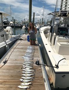 Two people enjoying a fishing cruises in NC