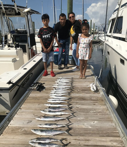 4 people fishing at Wrightsville Beach