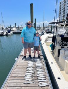Two people enjoying a cruises and fishing trip in NC