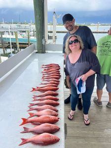 Two people fishing at Orange Beach