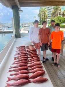 4 people fishing at Orange Beach