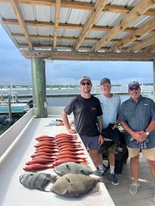 Three people fishing at Orange Beach