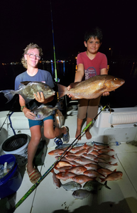 Two grey triggerfish, 21 inches long, caught during a fishing cruise in FL