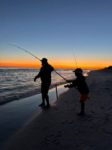 Reeling in the big one at Santa Rosa Beach!