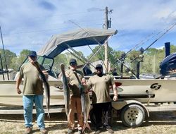 Successful fishing trip in California MO showing three large fish caught