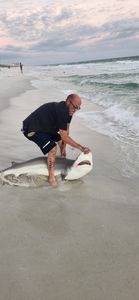 A person fishing in FL
