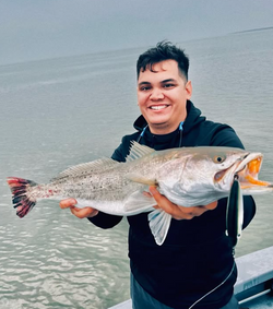 Caught a spotted weakfish, a 22-inch fish, while fishing in South Padre Island