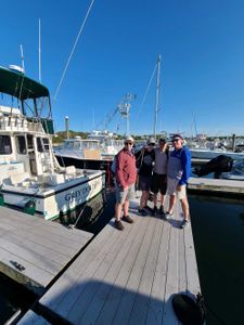 Four people fishing in MA
