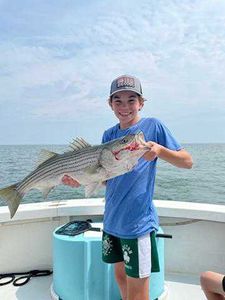Caught a beautiful striped bass while fishing in MA