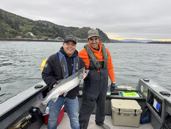 Nice coho salmon using trolling and drift fishing techniques on cloudy waters