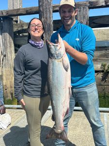 Coho salmon caught by two people in Corvallis