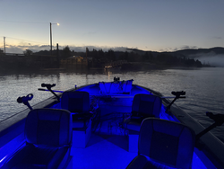 Perfect evening for trolling in these calm waters. Blue lights ready for the best adventure ahead.