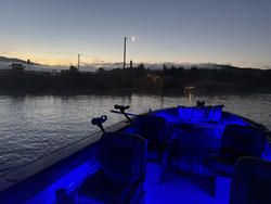 Perfect evening for trolling on calm waters. Blue lights setup for the best adventure.