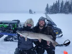 Angler with a 33-inch Northern Pike caught in MB
