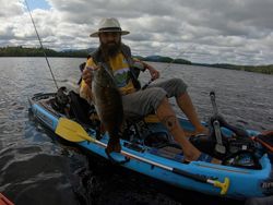 Lone angler fishing at Saranac Lake