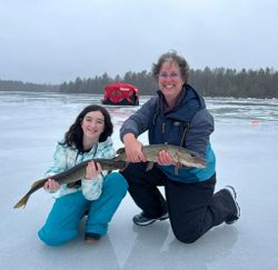 Two anglers fishing at Saranac Lake