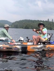 Two people fishing at Saranac Lake