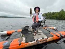 A single person fishing in Saranac Lake