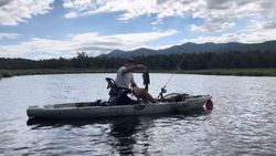 Angler enjoying a fishing trip in Saranac Lake