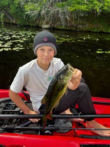 Single fisherman catching a fish in NY