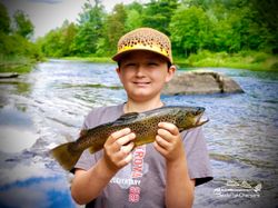 Lone angler fishing at Saranac Lake