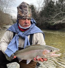 Angler with a 17-inch rainbow trout in Pittsburgh
