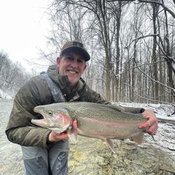 A large rainbow trout caught by two anglers in Pittsburgh
