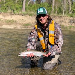 Photo of a 14-inch rainbow trout caught in Pittsburgh, Pennsylvania while fishing.