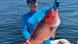 A person fishing in Galveston