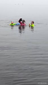 Snorkelers in calm water in Brooksville FL preparing for underwater exploration