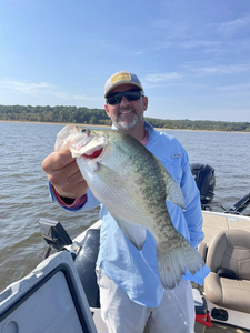 Angler catches a fish in the Mississippi river
