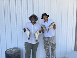 Two anglers fishing in the Mississippi River