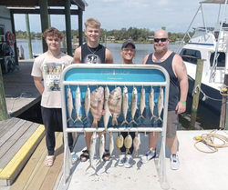 Three Spanish mackerel and sheepshead fish caught in Panama City Beach