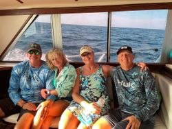 Four friends enjoying a fishing adventure in Florida