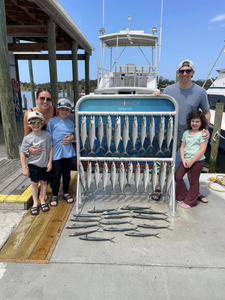 5 people fishing at Panama City Beach