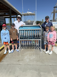 Group of 6 people enjoying a fishing trip in Panama City Beach