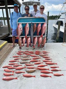 Anglers fishing in Florida with a catch of 6 fish