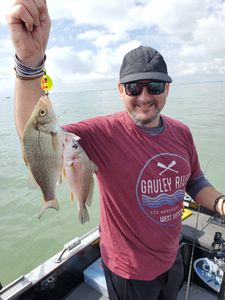 Two fishing enthusiasts enjoying the great outdoors in Clarkston