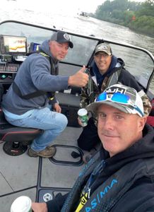 Three people fishing in Michigan