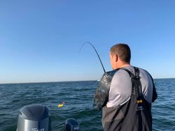 Angler enjoying a fishing trip in MI