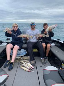 2 people fishing with rod and reel in MI